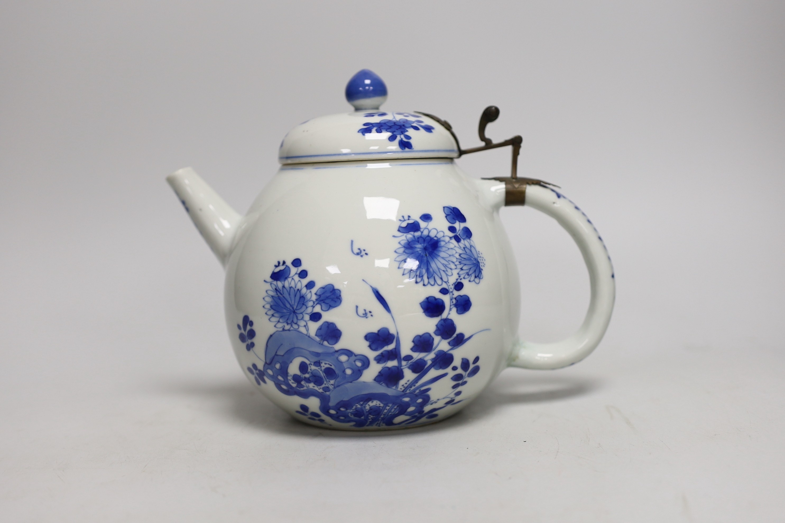 A Chinese blue and white tea or wine pot, Kangxi period, 17cms high